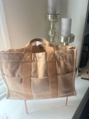 Authentic Hermès MM (medium) tote in the iconic cream canvas/  signature orange